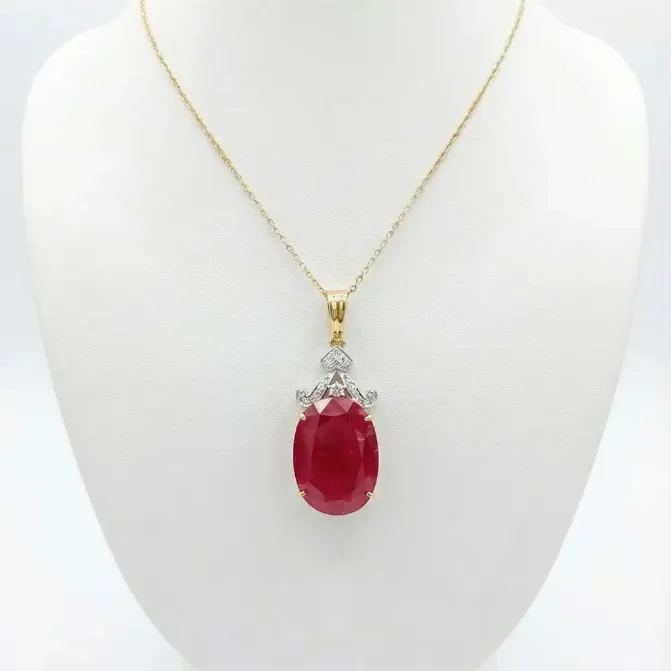 MANMET OVAL DIAMOND PENDENT