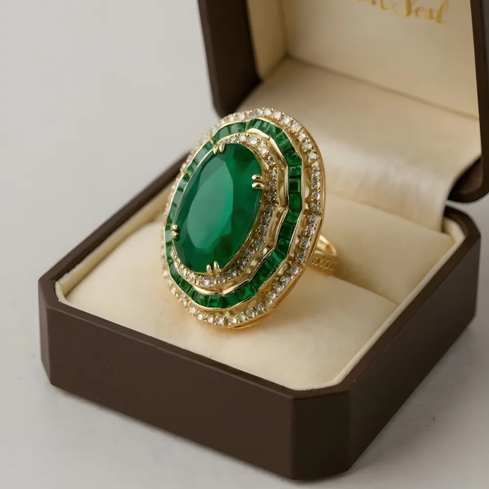 EMERALD OVAL  EMERALD ROUND DIAMOND RING