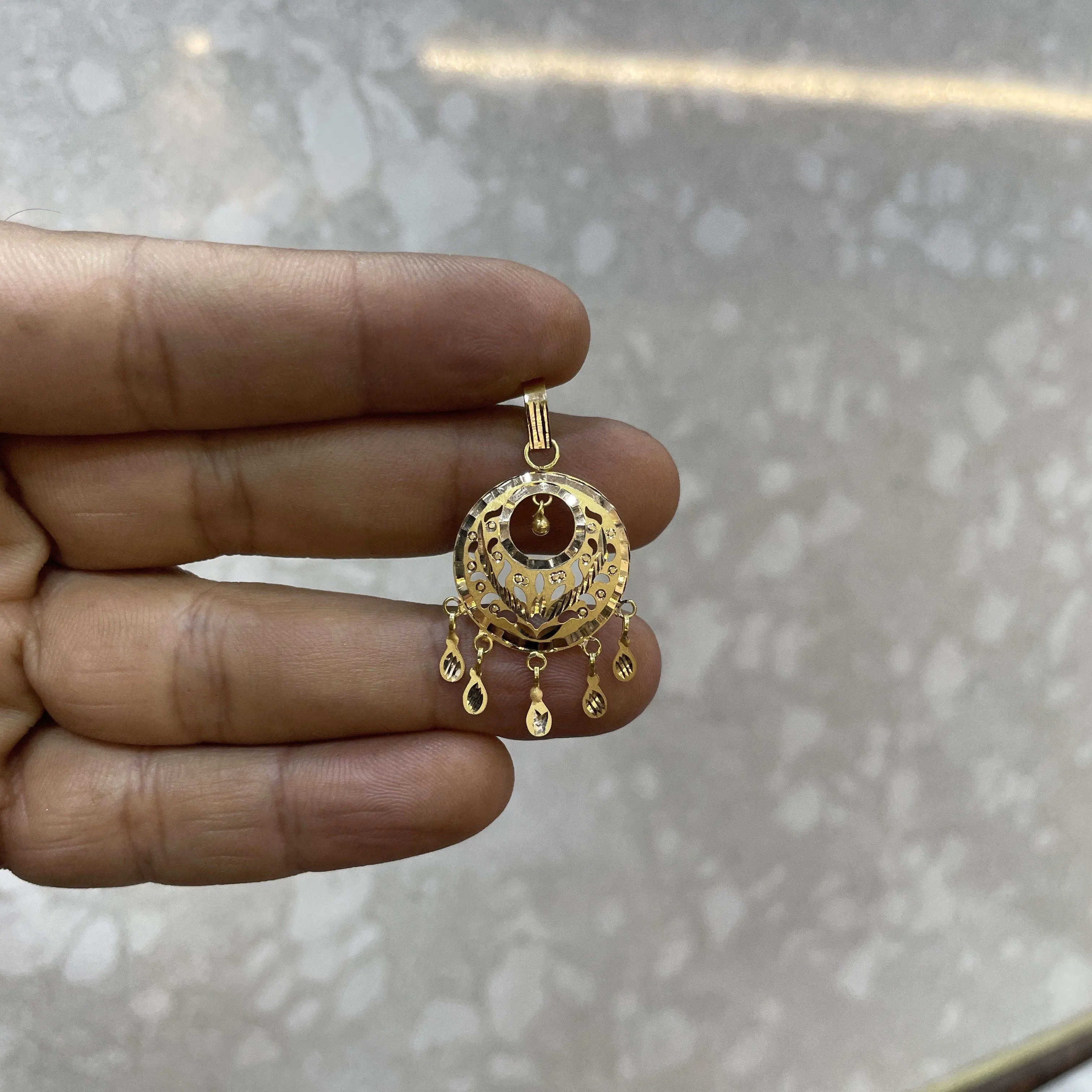 Lazer Cutting Gold Pendant
