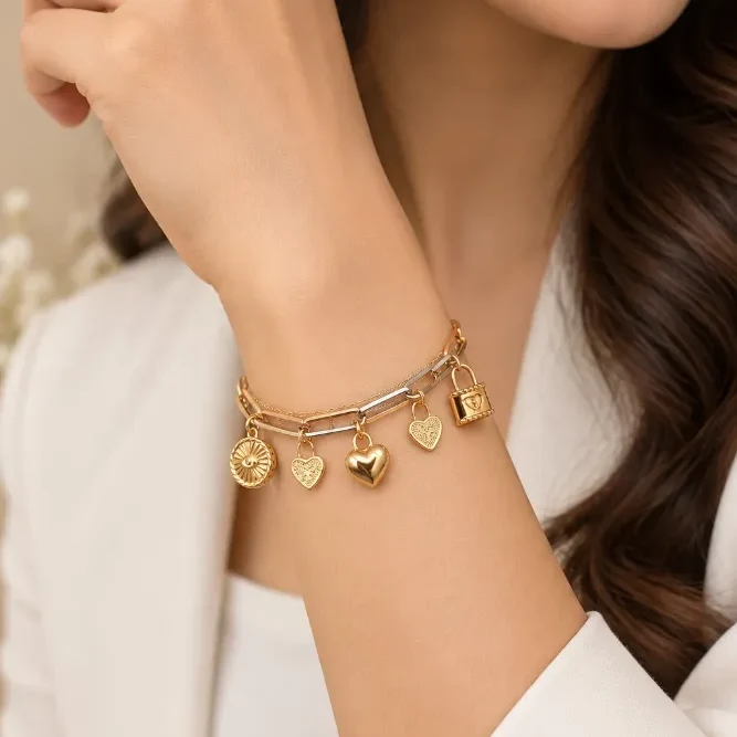 Crafted in 18K HUID Hallmarked Gold, the Charms of Love Gold Bracelet from Swastik Jewellers is a stylish expression of individuality, featuring a contemporary chain-link design accented with charming dangling motifs. The bracelet combines polished gold links with subtle two-tone detailing, creating a modern layered look, while the centre