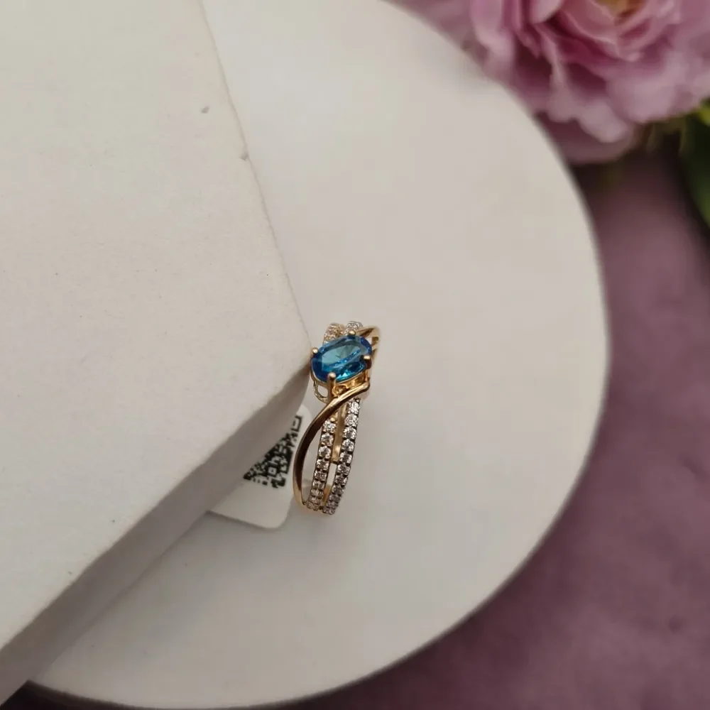 Blue Sapphire Twist Rose Gold Ring