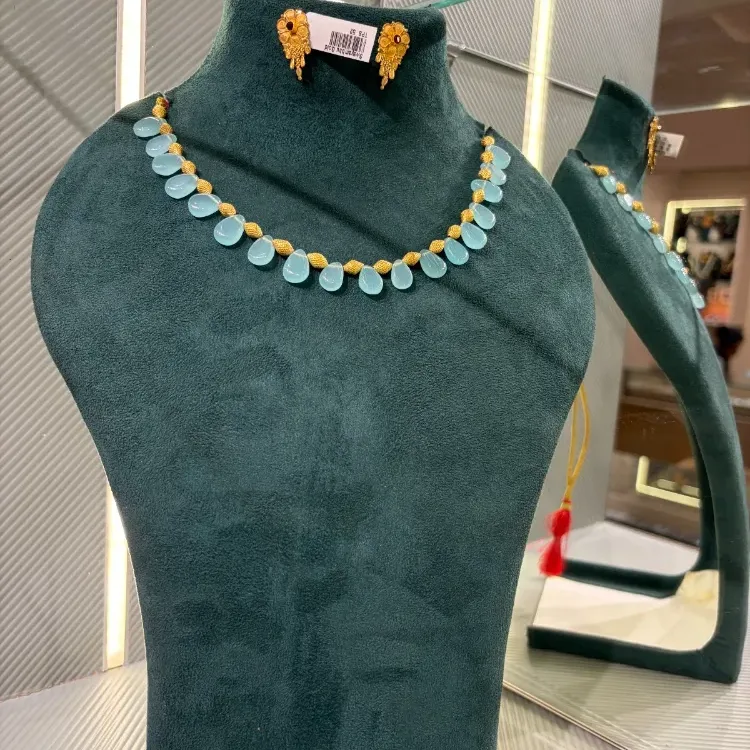 Wax Mani Necklace