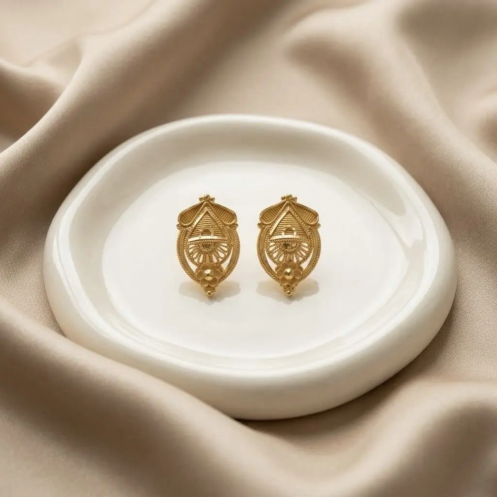Leaf shaped earrings with floral drop